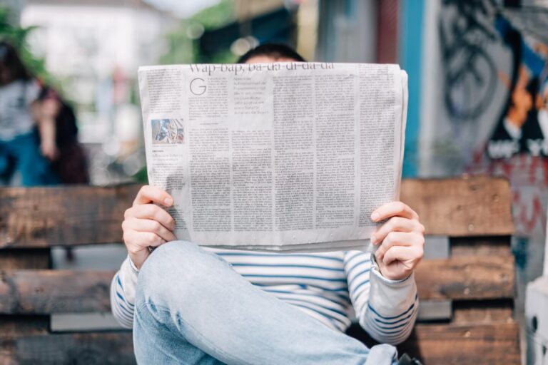 man-reading-newspaper